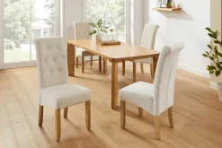 Design Stuhl CASA beige Bouclé Tweed Soft Massivholzbeine Zierknöpfe und Nackenrolle