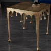 Extravaganter Couchtisch LIQUID LINE L 46cm gold Tropfen-Design