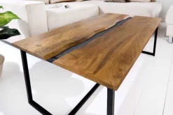 Massiver Couchtisch AMAZONAS 110cm Mangoholz Metall schwarz Baumkante Honey Finish