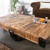 Massiver Design Couchtisch RAILWAY 110cm Mangoholz mit 4 Rädern