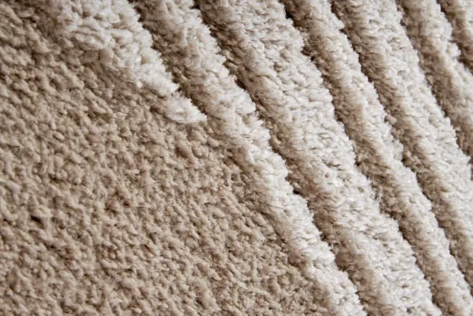 Moderner Hochflor Teppich ELLE DECORATION 235x160cm beige geometrisches Muster
